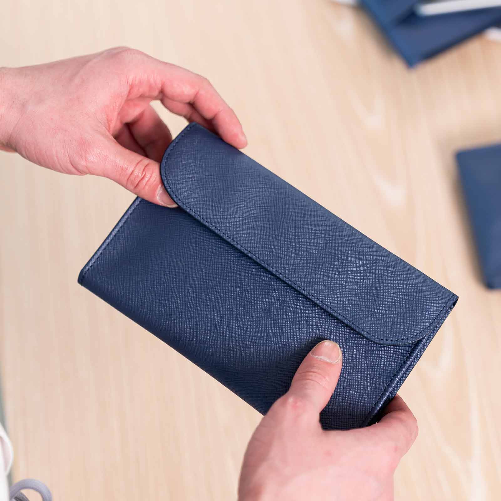 Chic dark blue vegan leather double watch case with a clean, luxury finish.