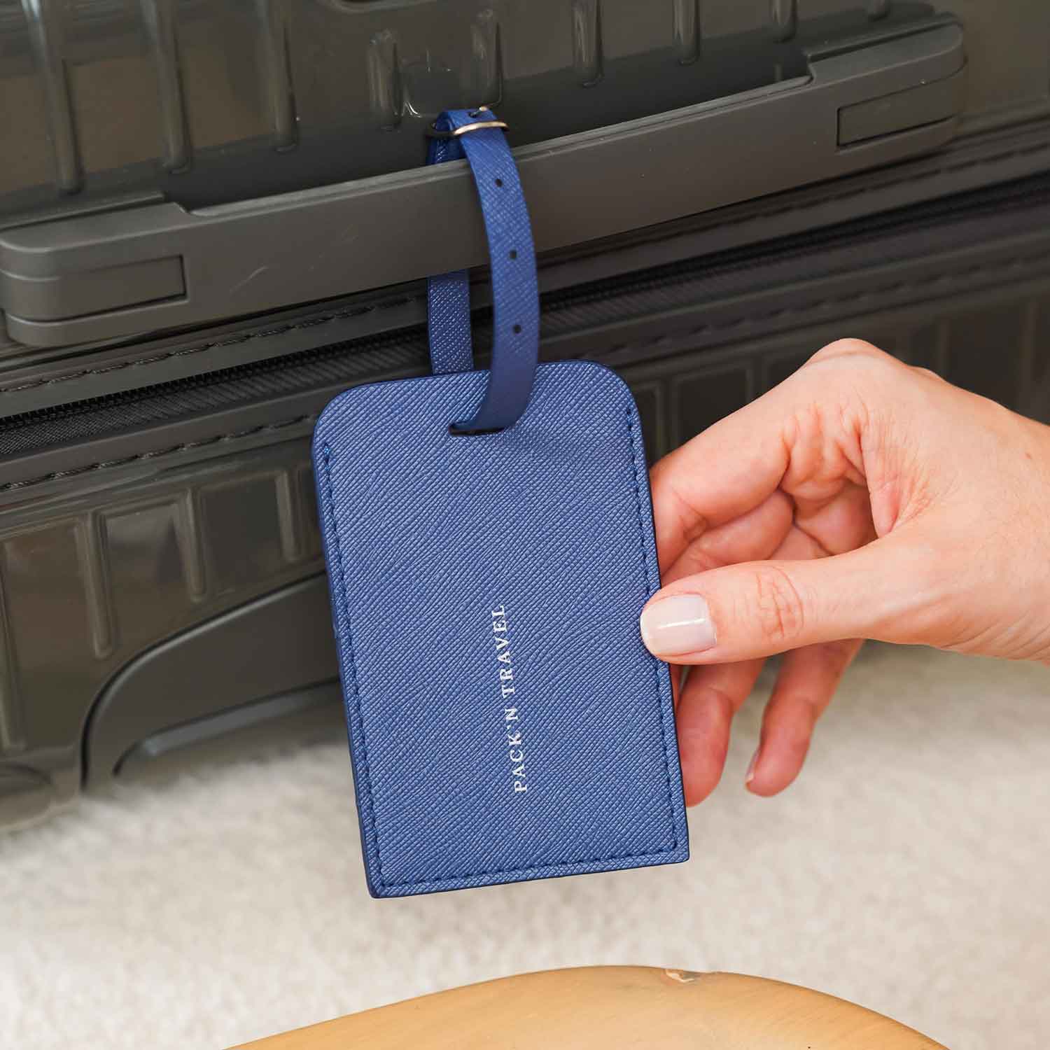 Chic dark blue vegan leather luggage tag adds flair to your suitcase.
