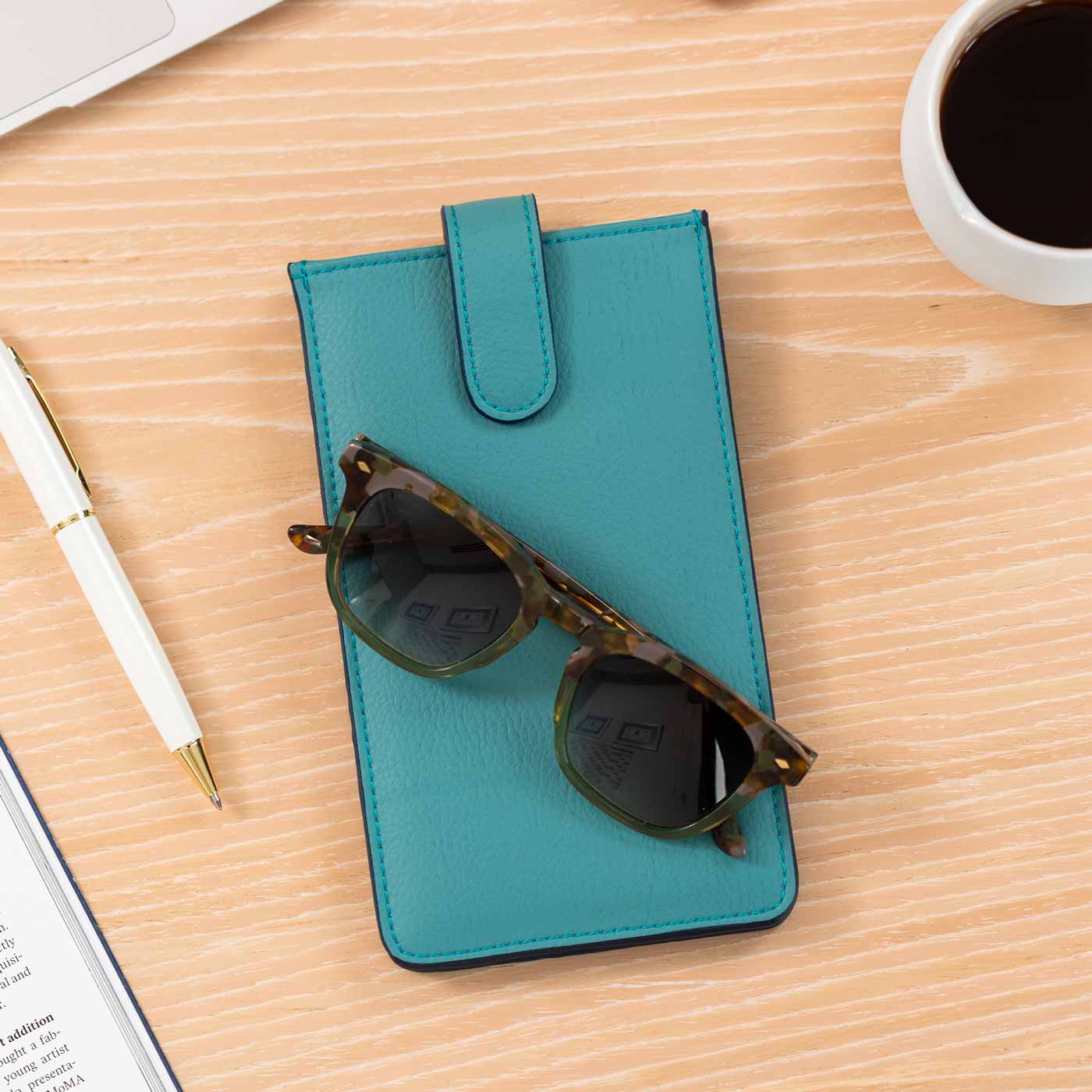 Chic turquoise vegan leather glasses case adds fun and function to your bag.