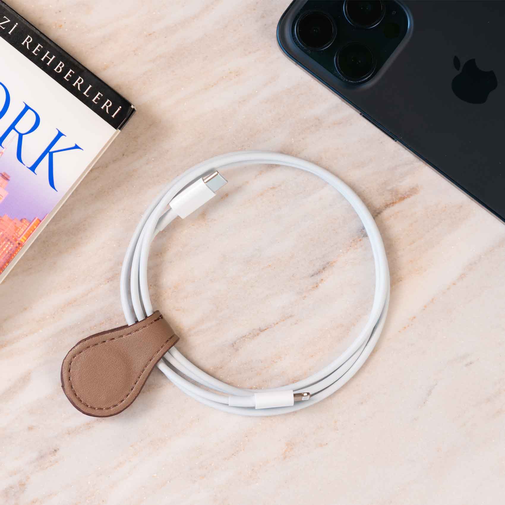 Durable beige cable tie crafted for reliable everyday organisation of cables and cords.