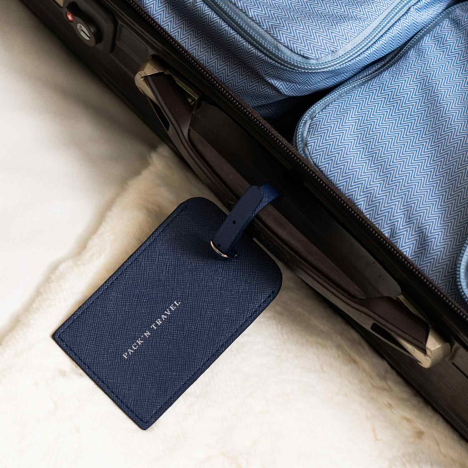 Durable dark blue vegan leather luggage tag crafted for lasting use.