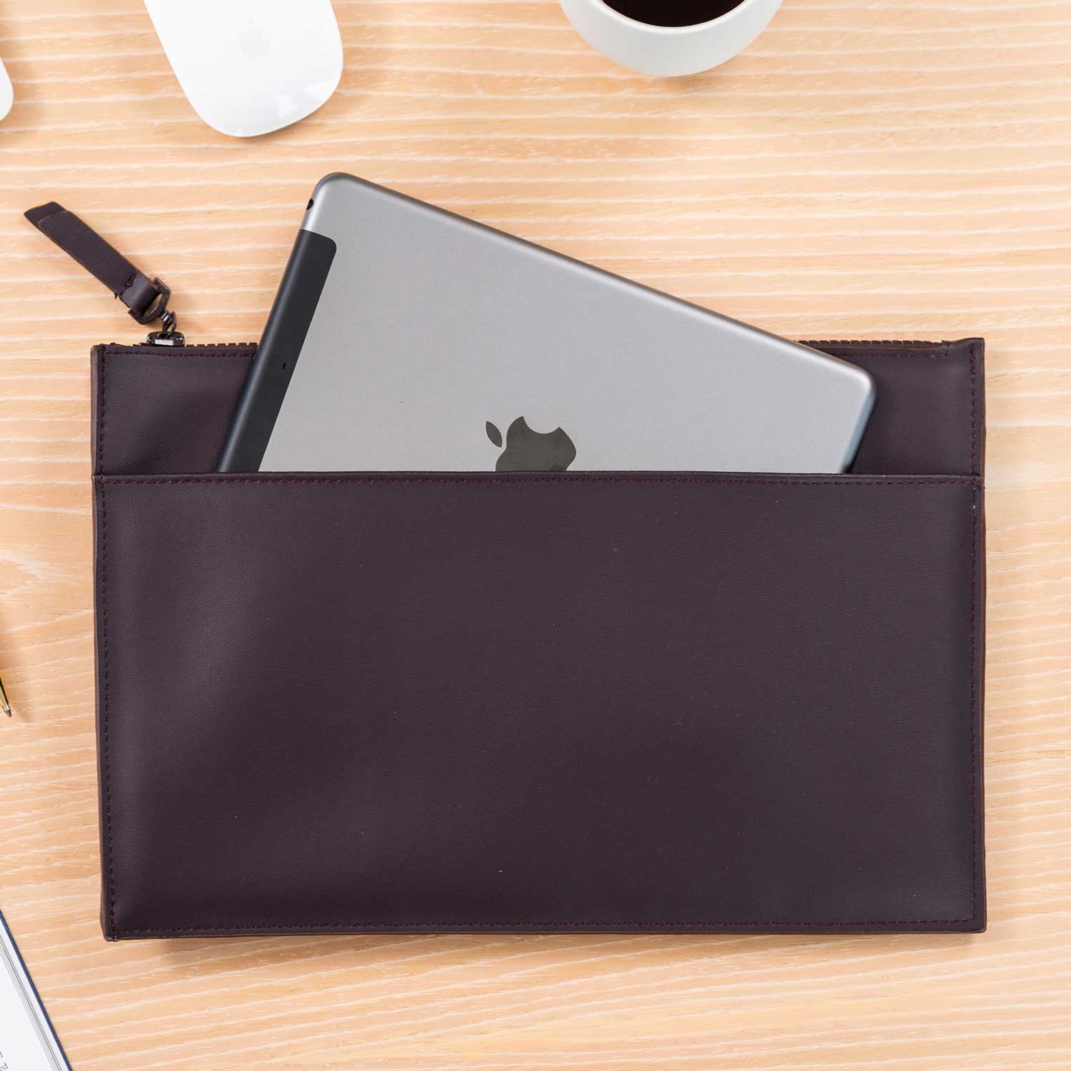 Durable deep plum vegan leather clutch built for long-term, elegant use.