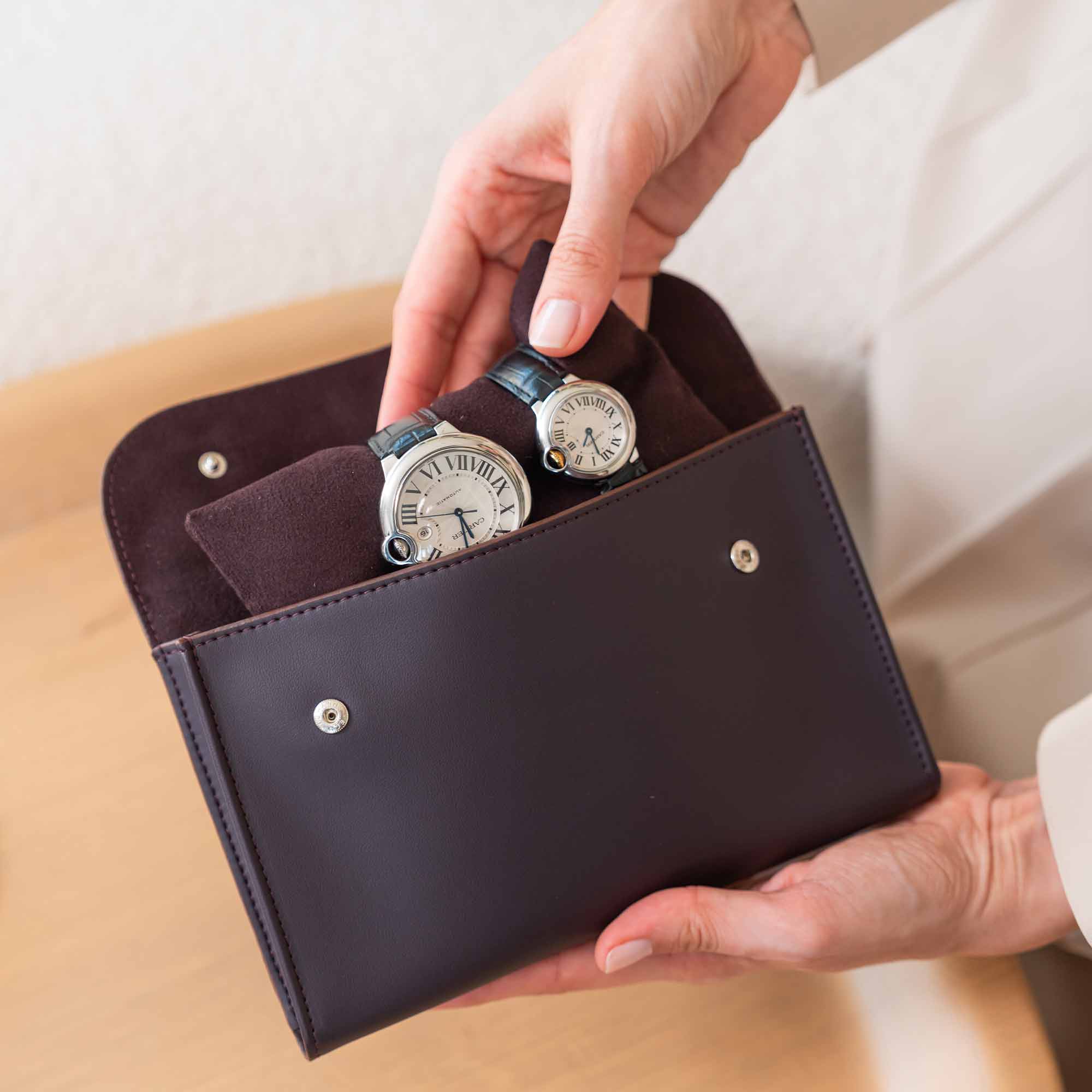 Durable deep plum vegan leather double watch case for long-lasting protection.