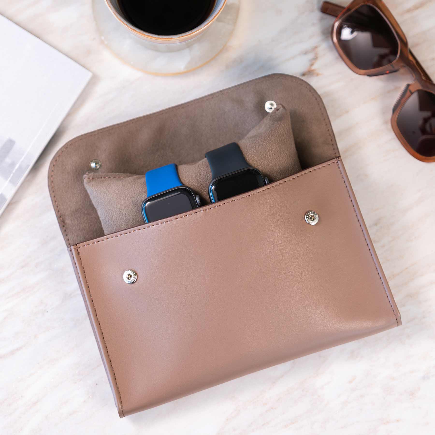 Elegant beige vegan leather double watch case for timeless accessory care.