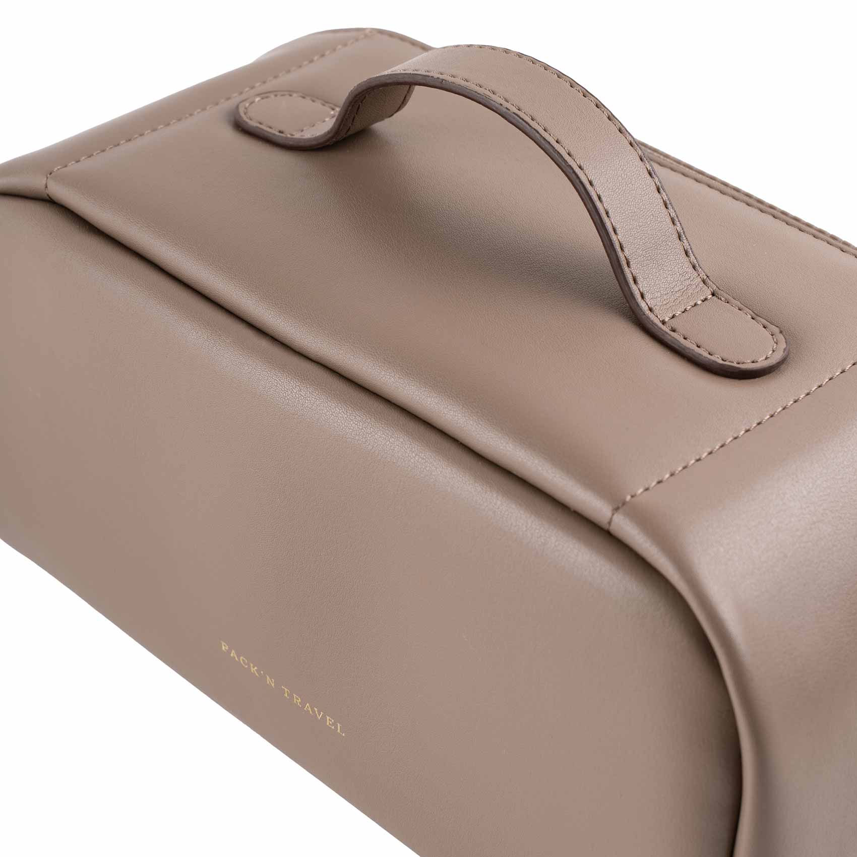 Luxury beige vegan leather make-up bag for stylish and organized beauty storage.
