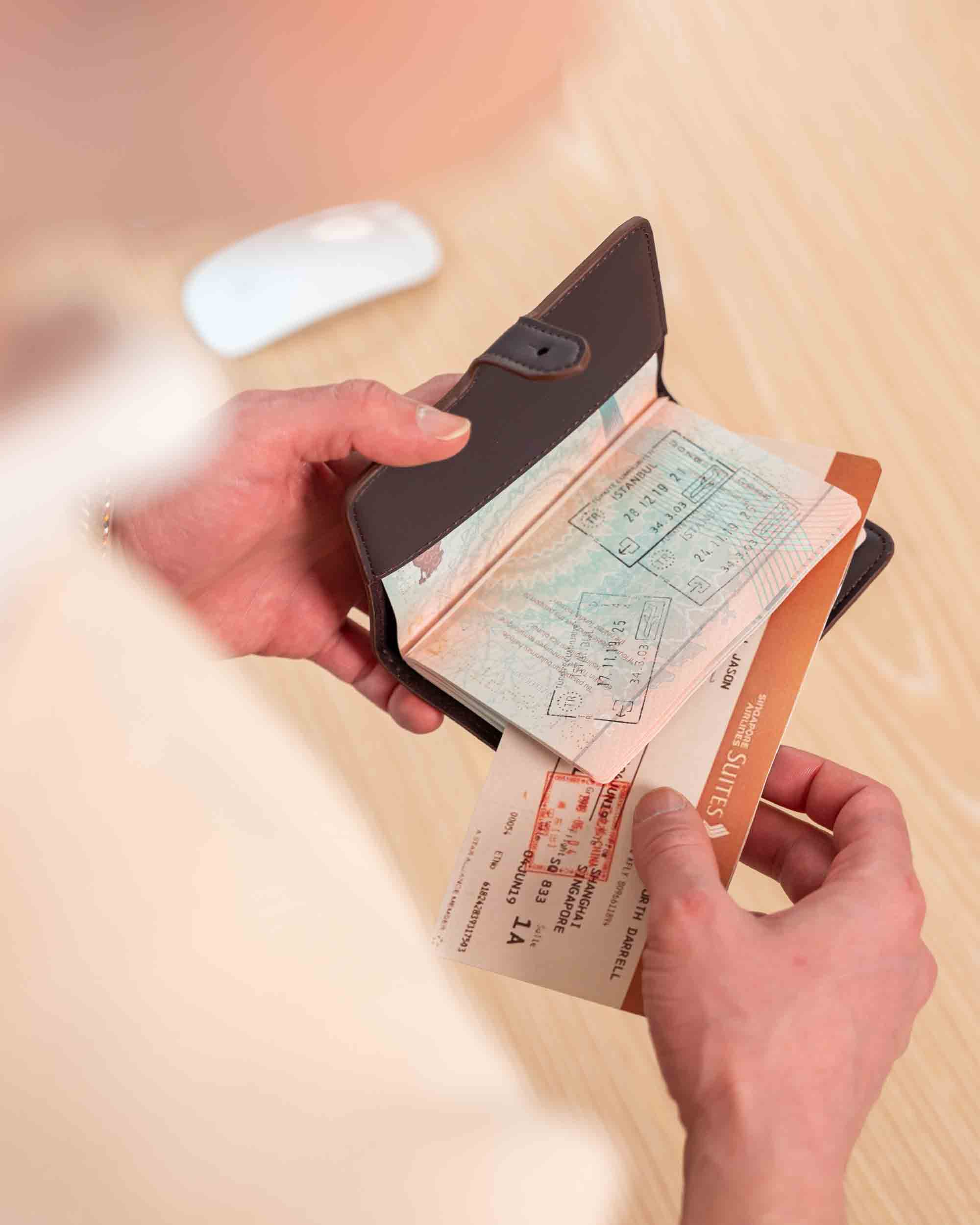 Luxury deep plum vegan leather passport holder crafted for modern travelers.