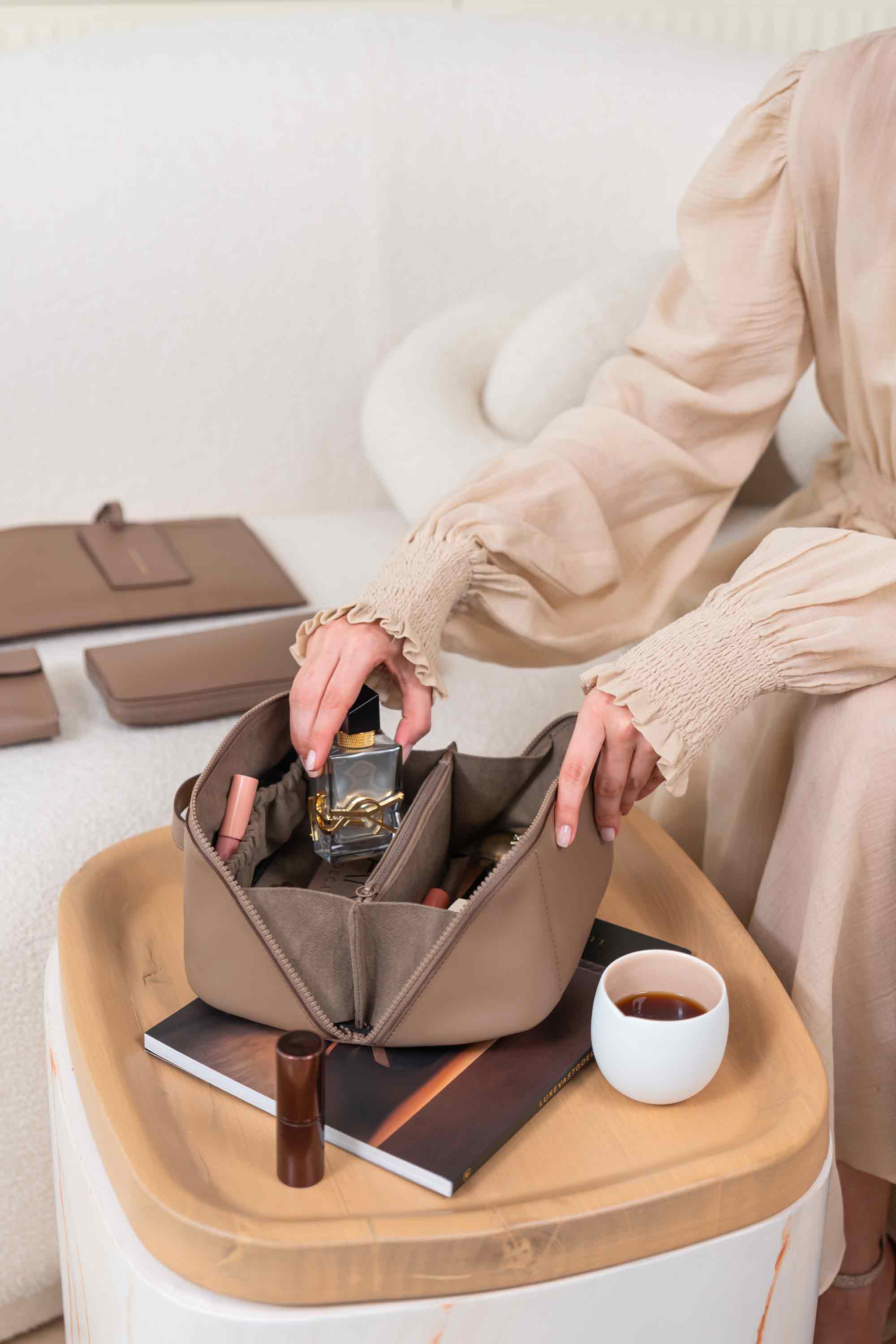 Practical beige make-up bag crafted for stylish and convenient daily storage needs.