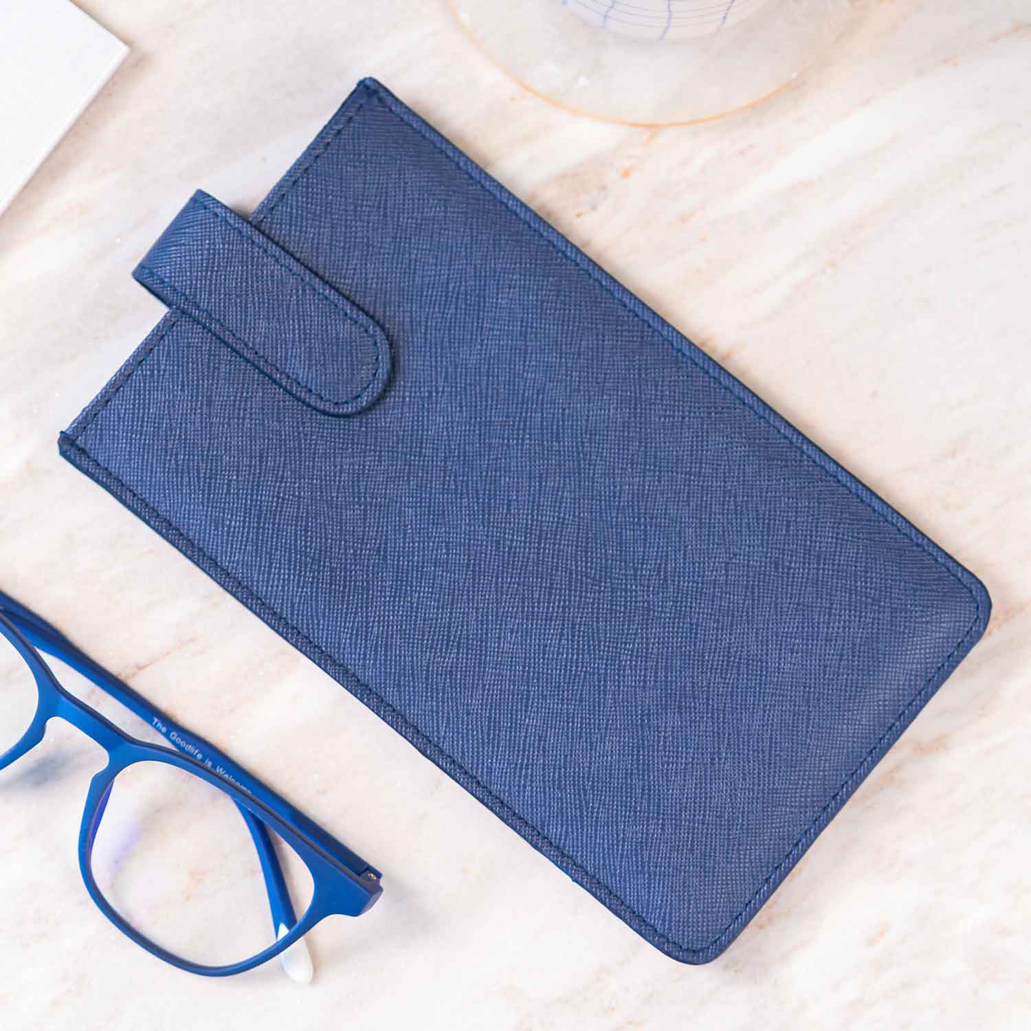Practical dark blue vegan leather glasses case ideal for daily eyewear care.
