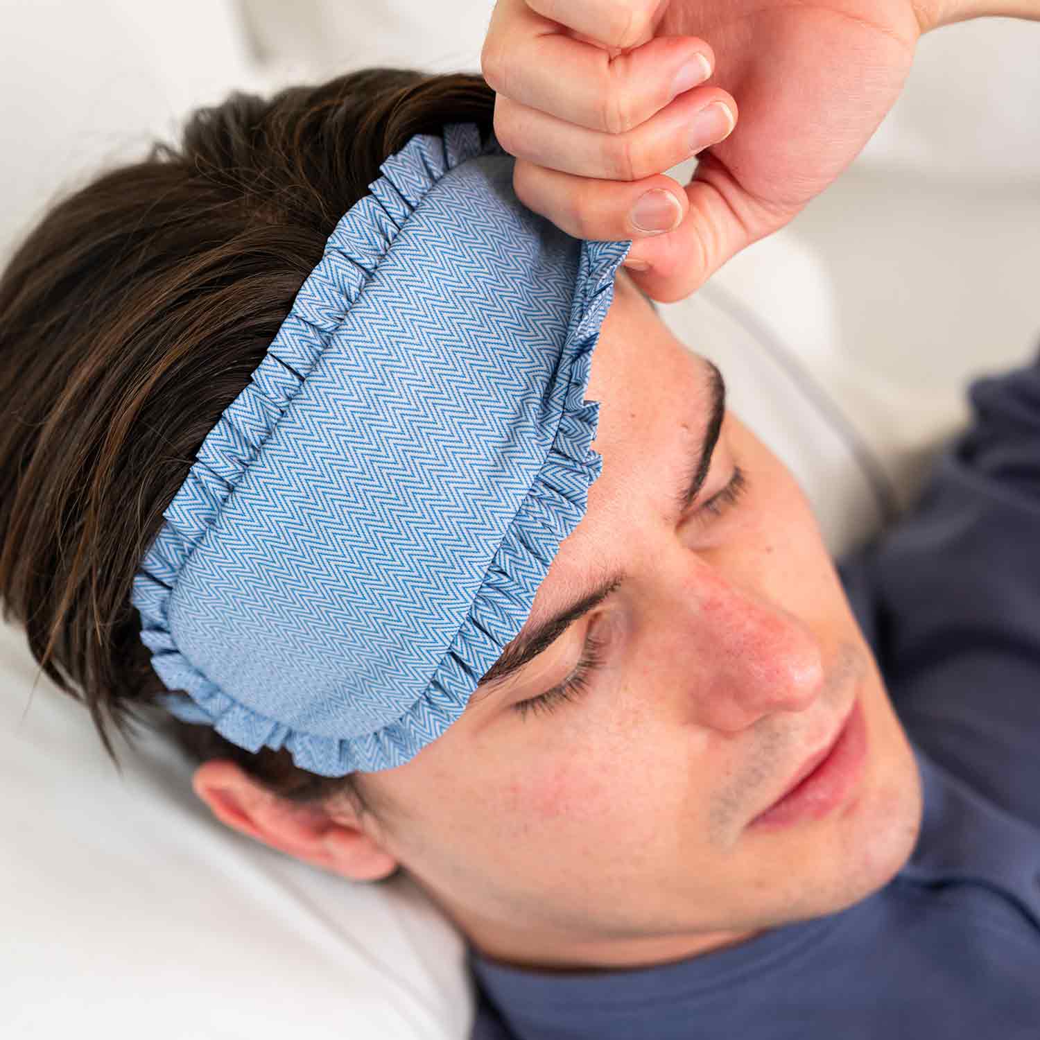 Practical blue vegan leather sleep mask gives comfort and durability night after night.