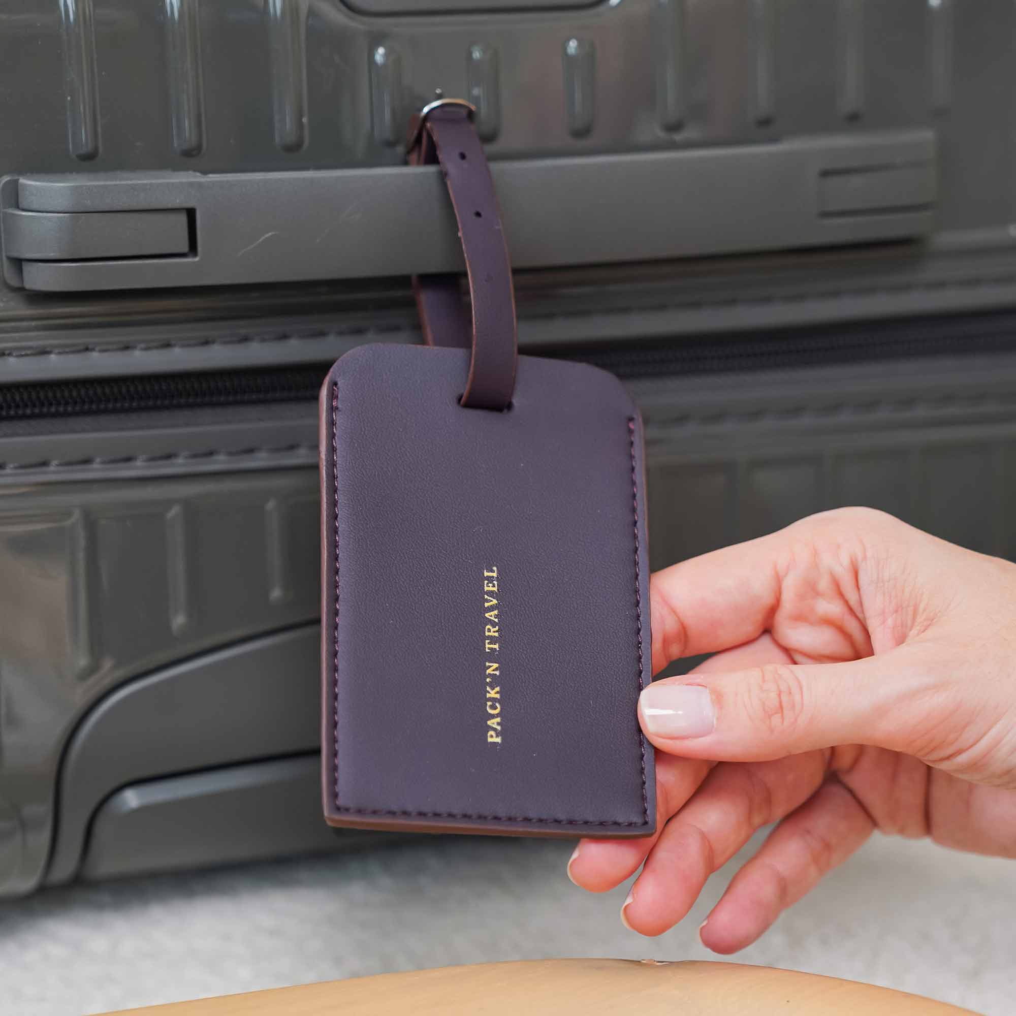 Stylish deep plum vegan leather luggage tag with vibrant and bold tone.