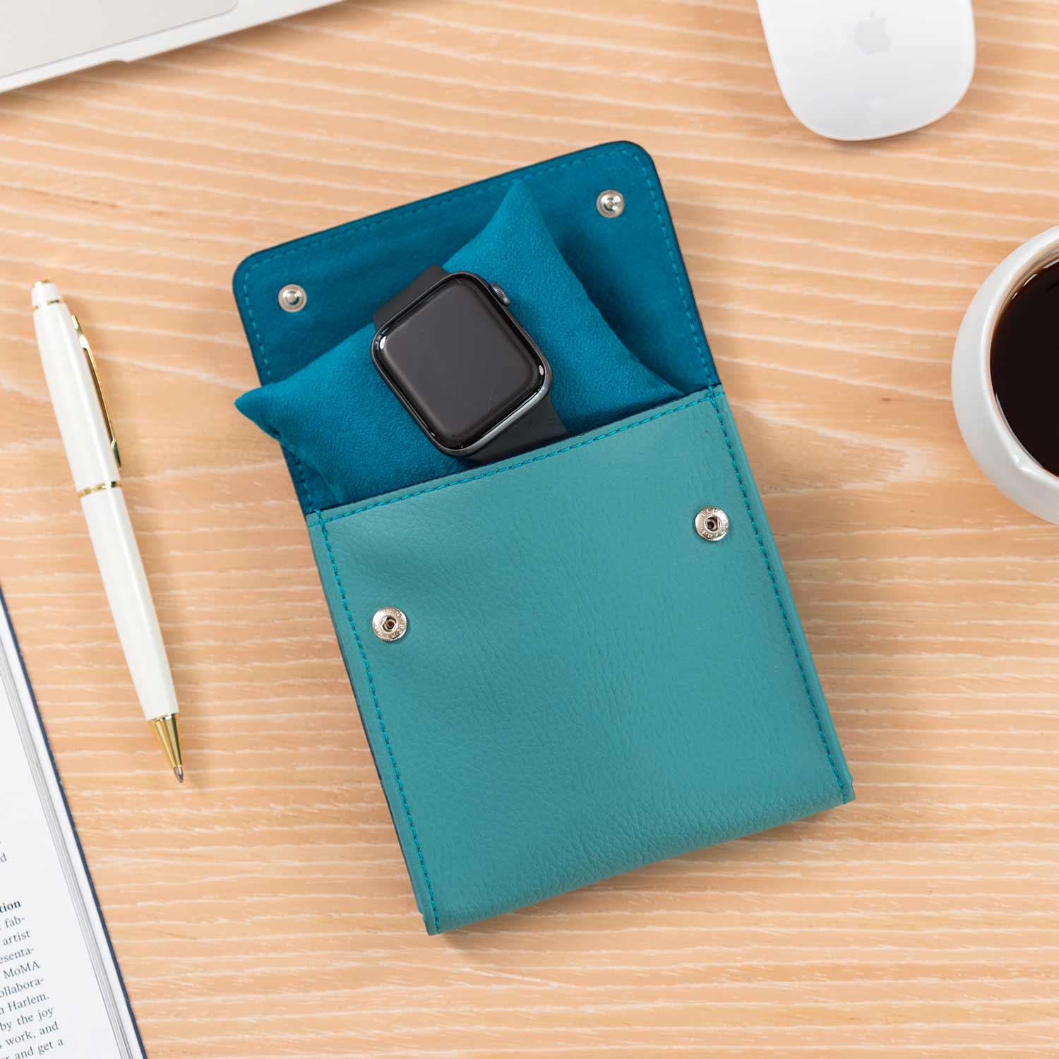 Stylish turquoise vegan leather single watch case with a colorful, sleek look.