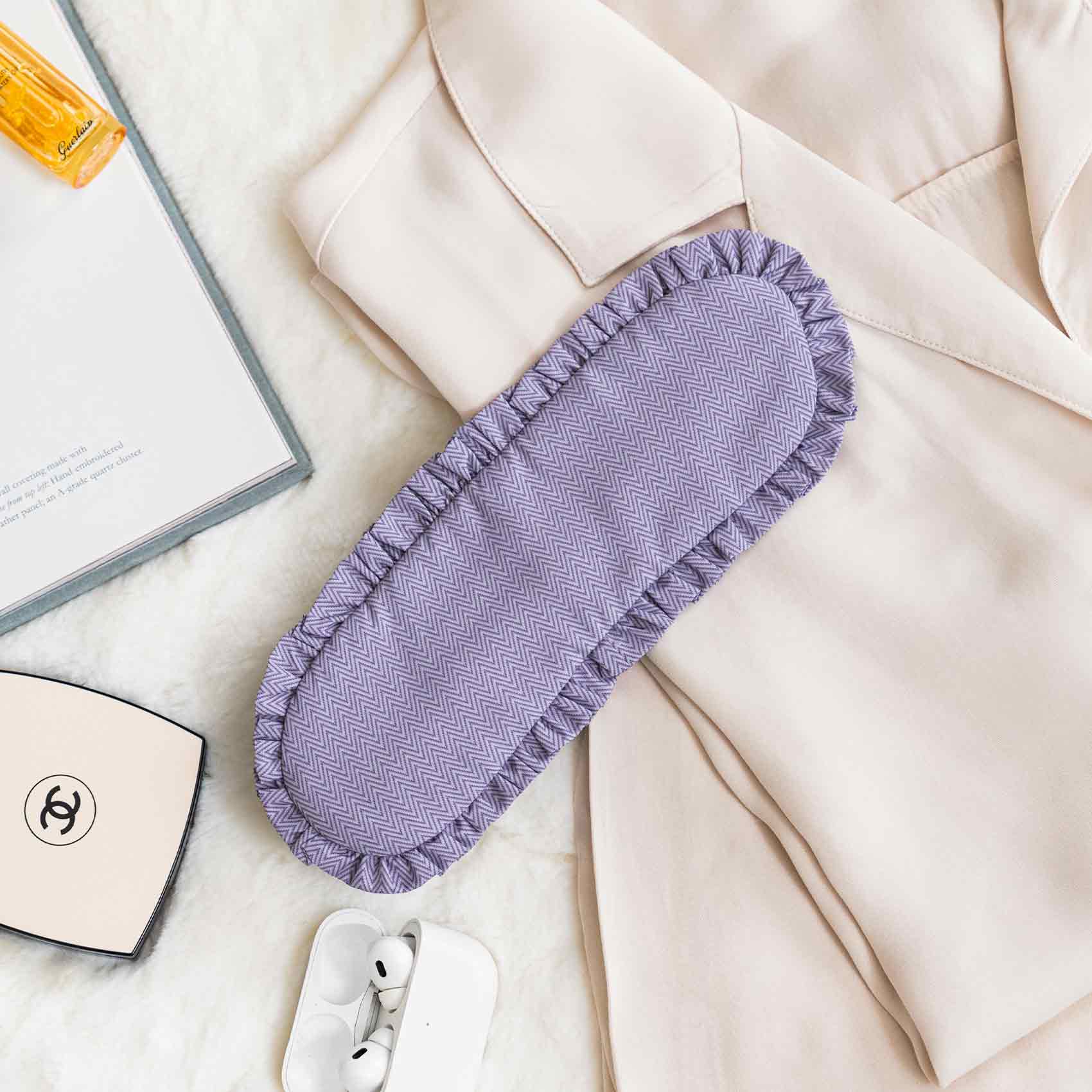 Stylish purple vegan leather sleep mask crafted for chic travelers and comfort lovers.