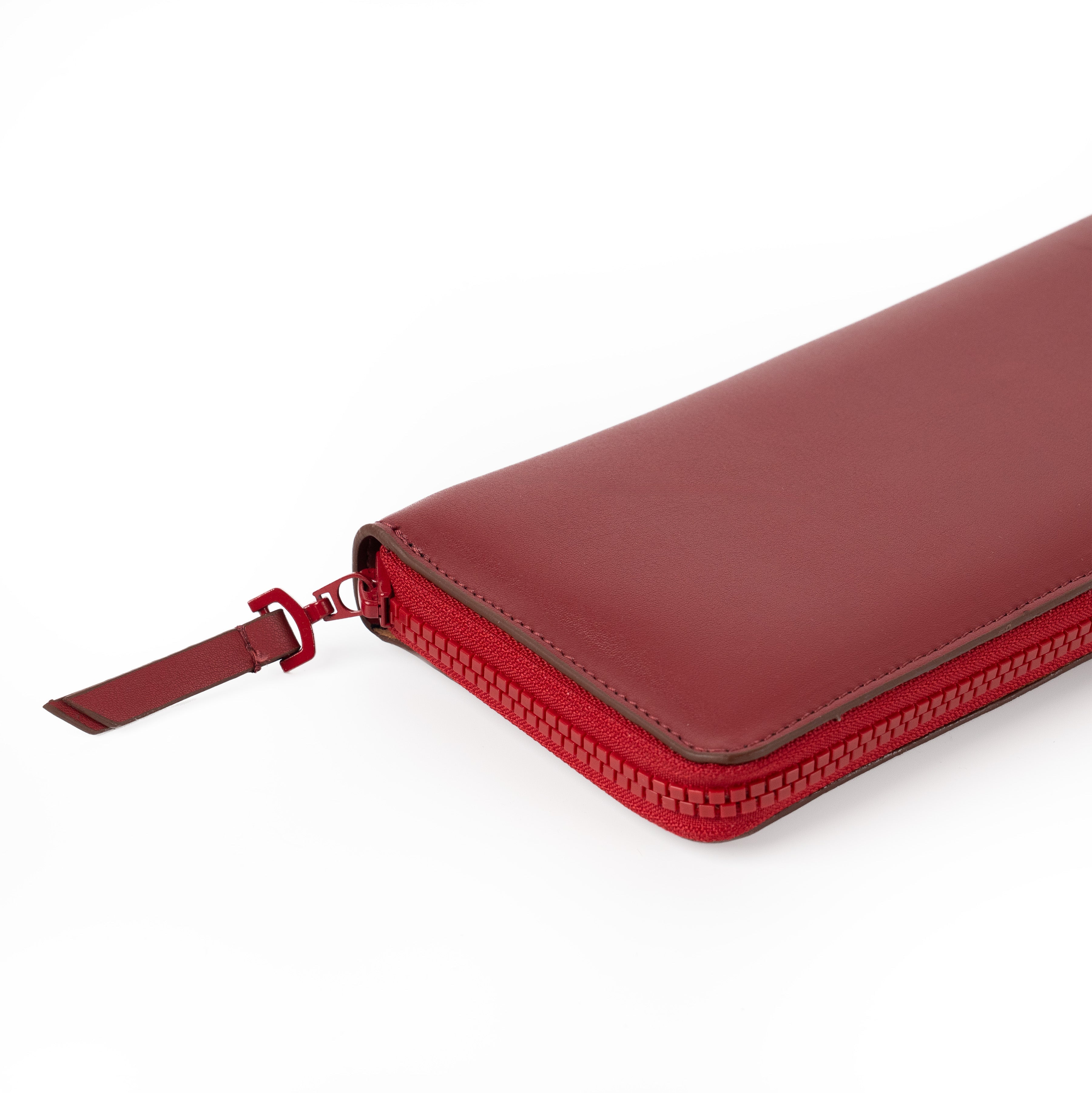 Durable vegan leather Pack'n Travel cherry red jewellery wallet crafted for secure travels.