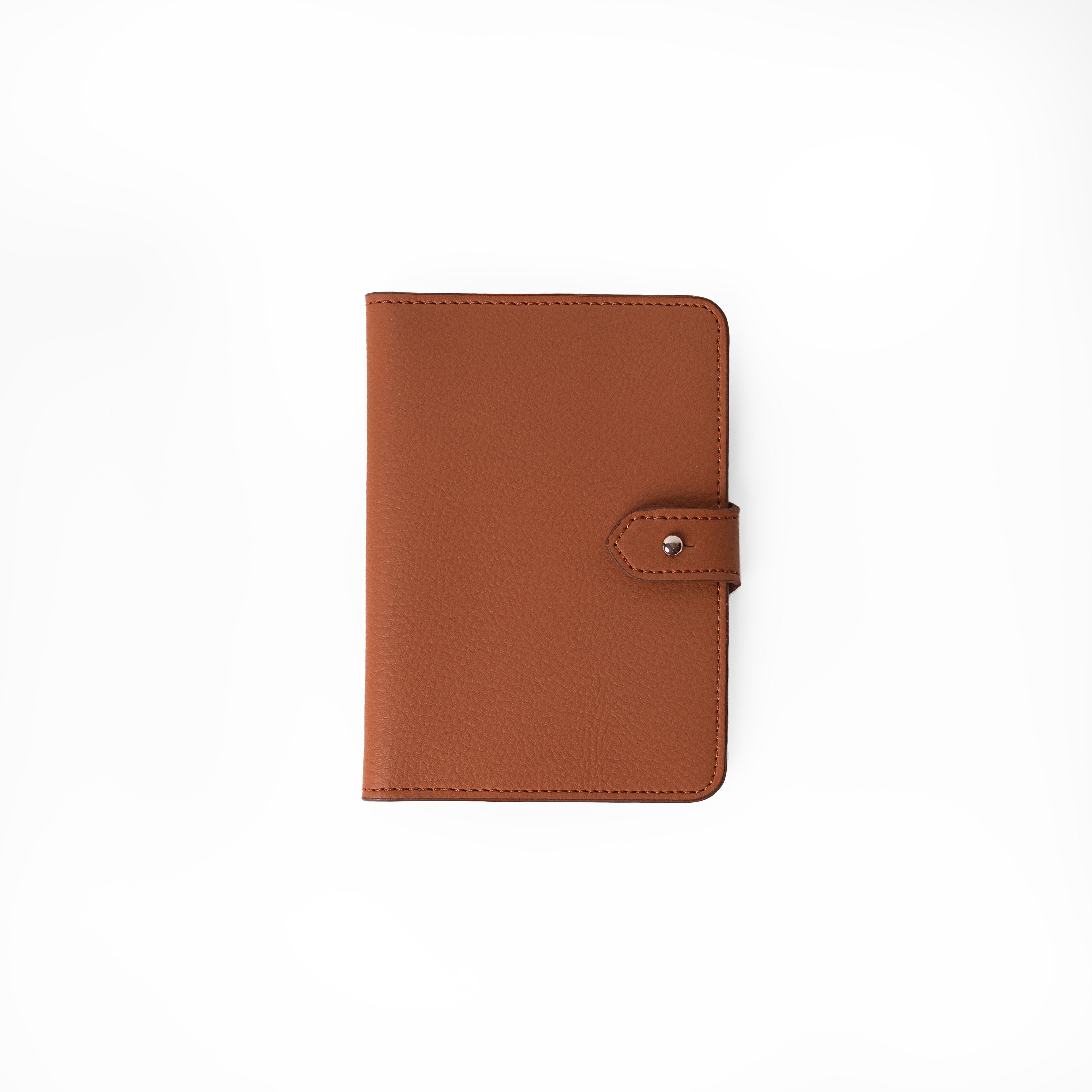 Luxury terracotta vegan leather passport holder crafted with elegance for modern travel.